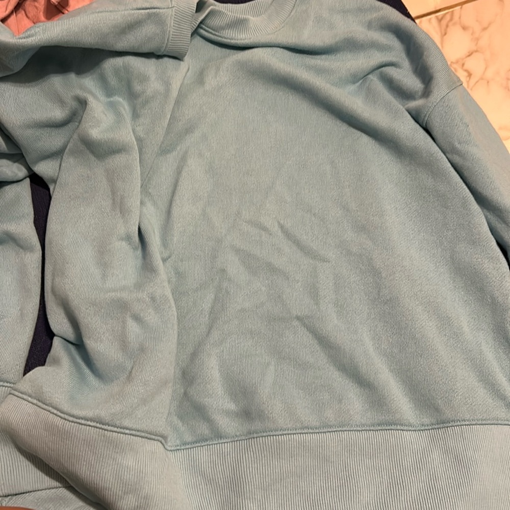 Small teal/blue sweater
